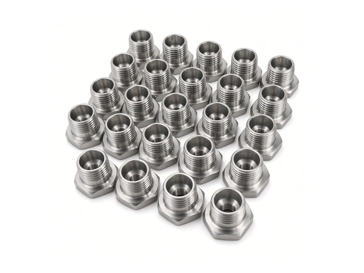 Production batch of CNC turned stainless steel hex threaded adaptors