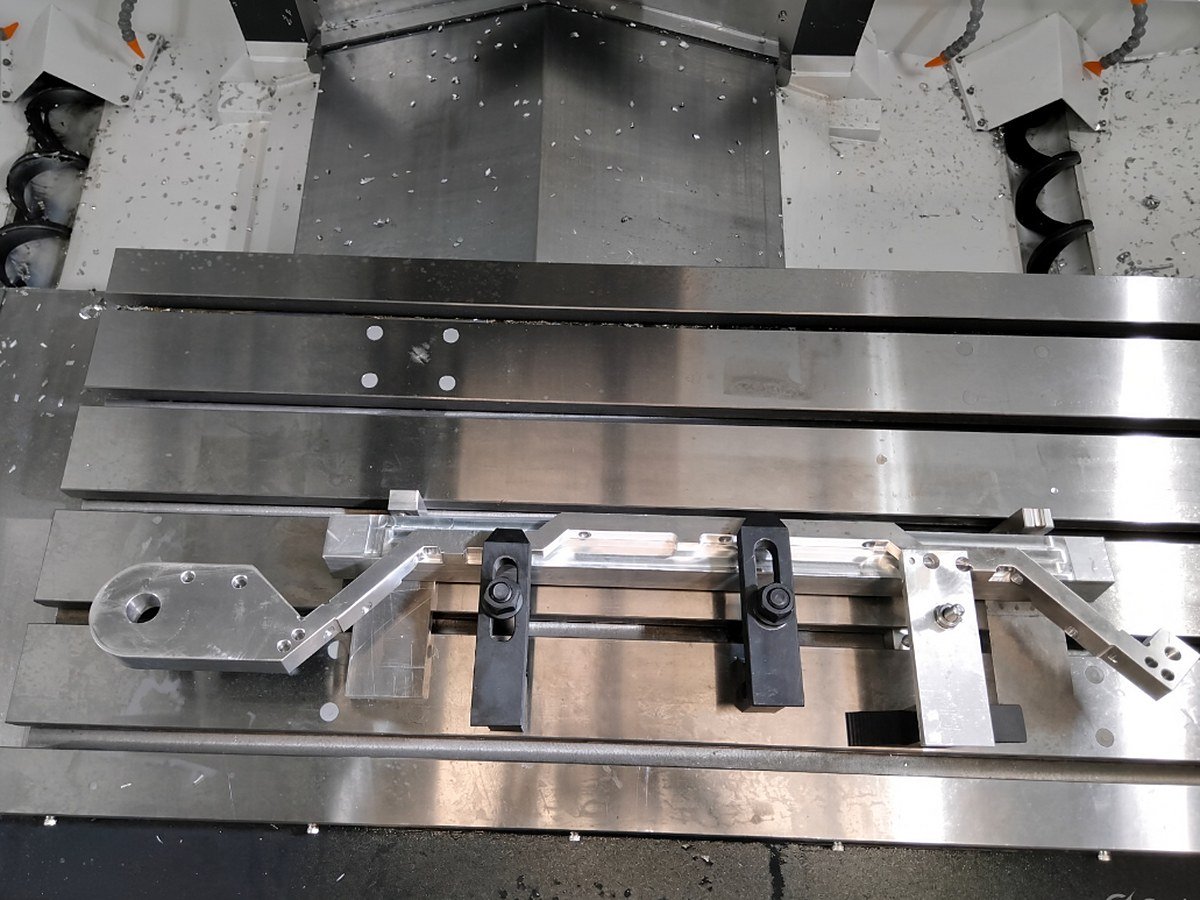 Bracket parts clamped to the machining centre table