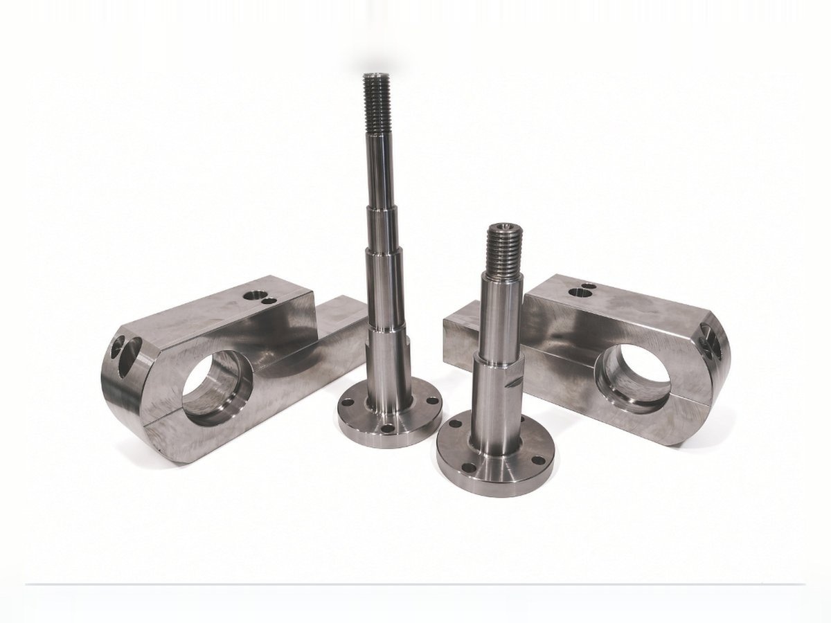 Machined flanged stepped shafts with matched split bearing housings
